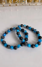 Load image into Gallery viewer, Light Blue Evil Eye Crystal Bracelets
